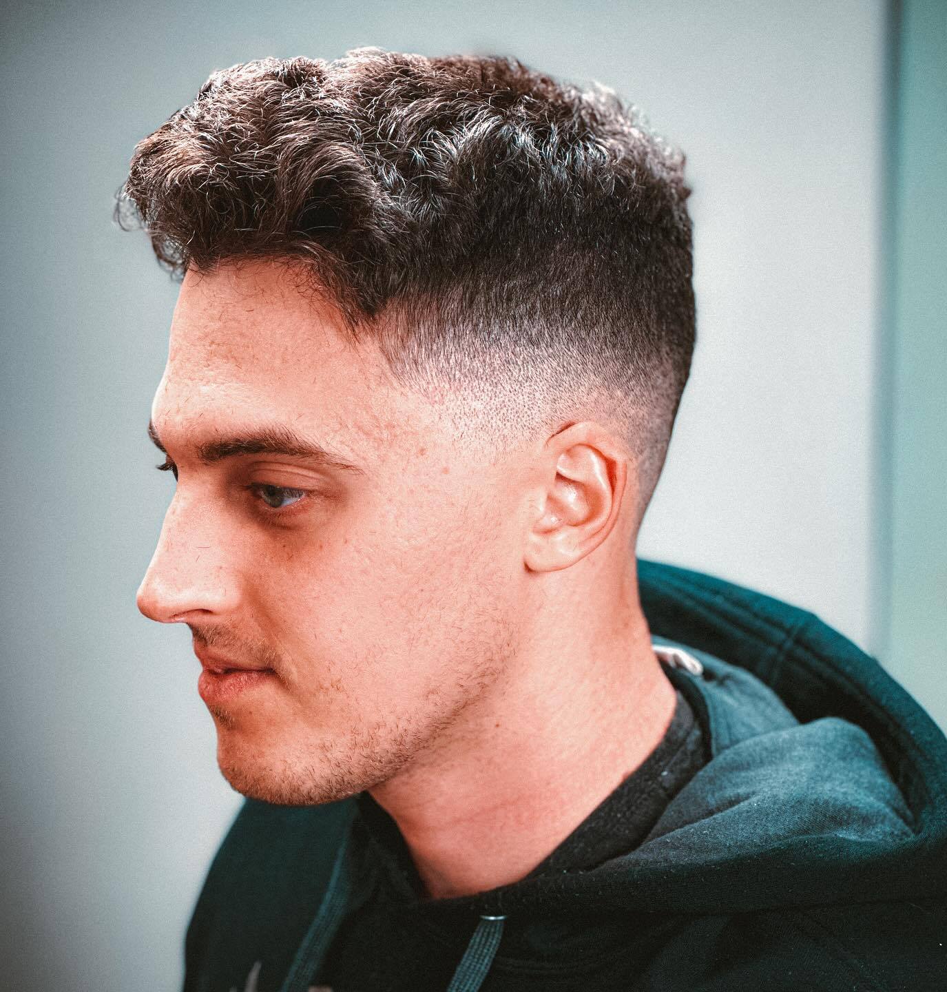 Midi Fade for Guys with Wavy Hair