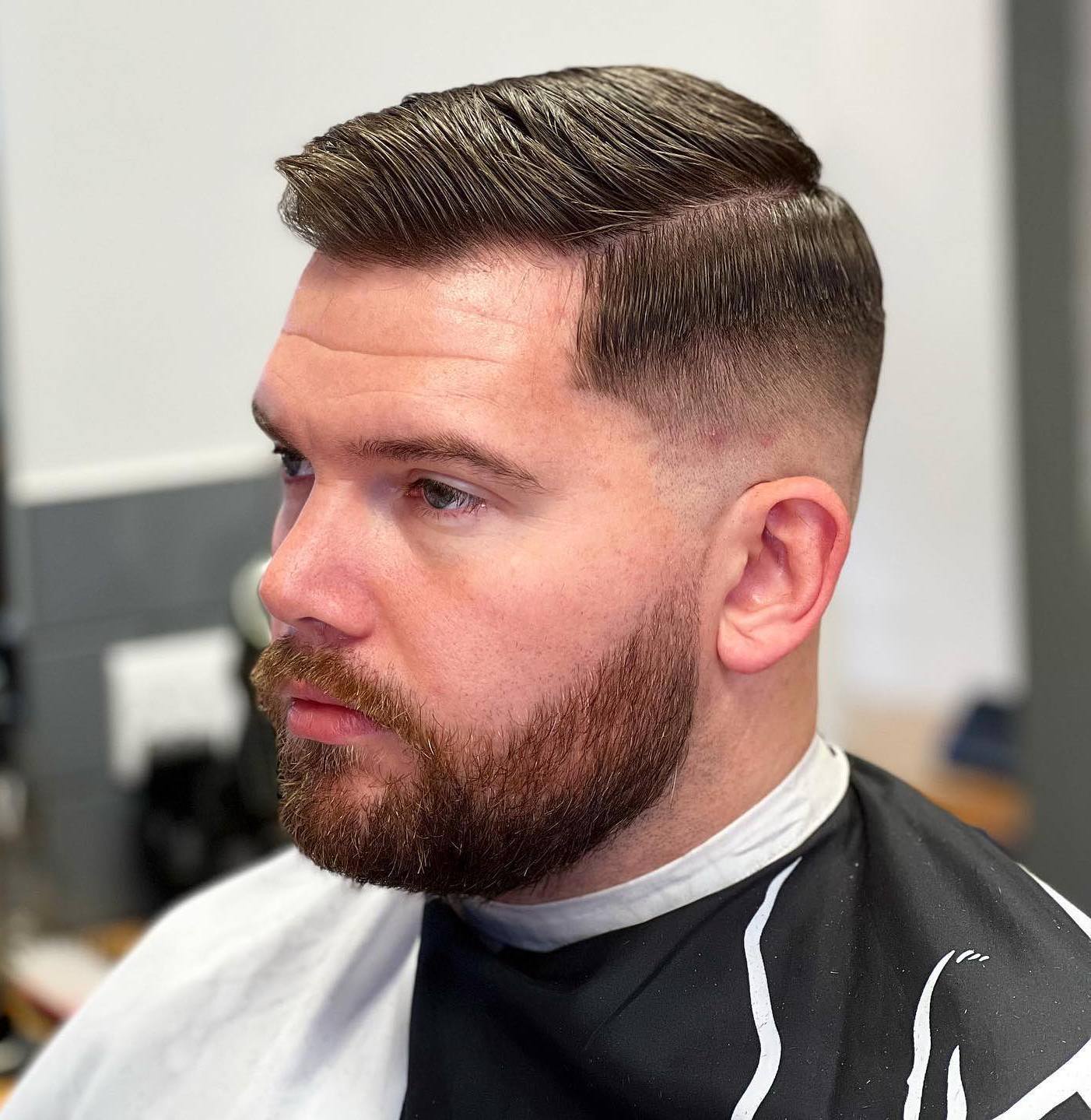 Men’s Polished Taper Fade with Facial Hairstyle